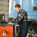 driver checks goods man uniform truck garage 1 1 1 1