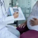 Choosing the Best Female Gynaecologist in Dubai Today midsection doctor explaining ultrasound pregnant woman hospital 177530 3917 1