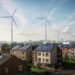 sustainable eco friendly community with wind turbines solar panels