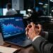 Investor hands clasped dim office 202607231922
