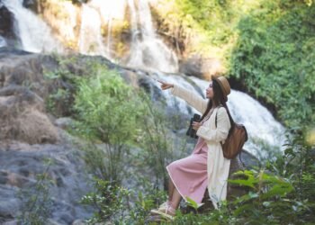 female tourists are walking nature 11zon