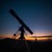 lucid origin A large equatorial telescope mount with counterweights and a long refractor tube 0