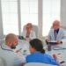 healthcare workers having meeting hospital conference room about symptoms patients analysing x ray clinic expert therapist talking with colleagues about disease medicine professional1