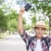 Cameroon Visa Fees imgi 124 129068541 asian tourist looking and finding the owner of black wallet that he found in tourist attraction