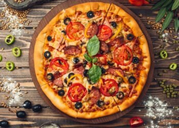 pizza pizza filled with tomatoes salami olives 140725 1200