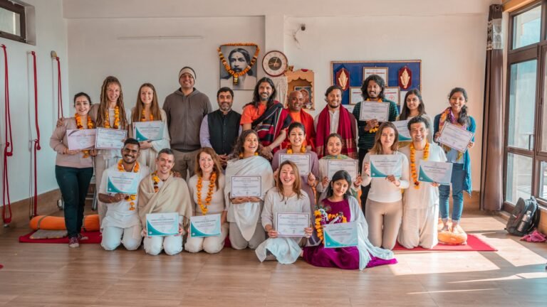 How to Choose a Yoga Teacher Training School in India students with their certificates